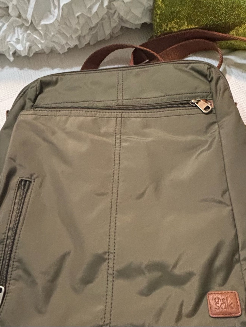 The Sak Olive Green Backpack with Brown Accents